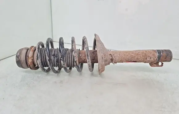 Volkswagen Golf IV Front shock absorber with coil spring 