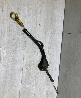 Oil level dip stick