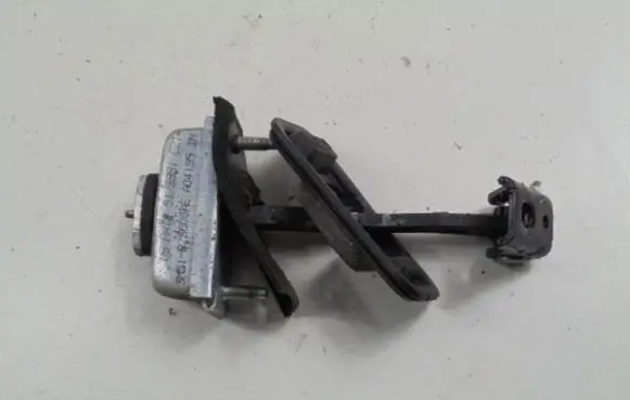 Rear door check strap stopper