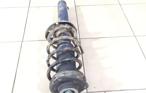 Volkswagen PASSAT B6 Front shock absorber with coil spring