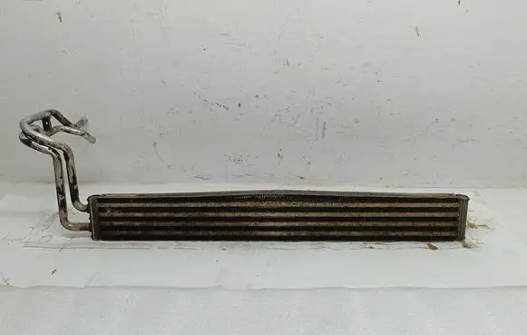 Volkswagen Touareg I Power steering radiator 7L6422885E E6358
