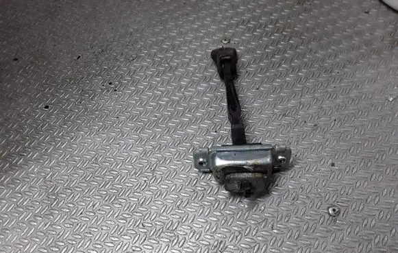 Front door check strap stopper