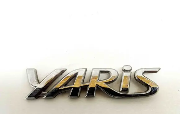 Toyota Yaris XP210 Manufacturers badge/model letters 