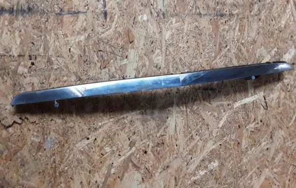 Engine bonnet/hood lock trim molding