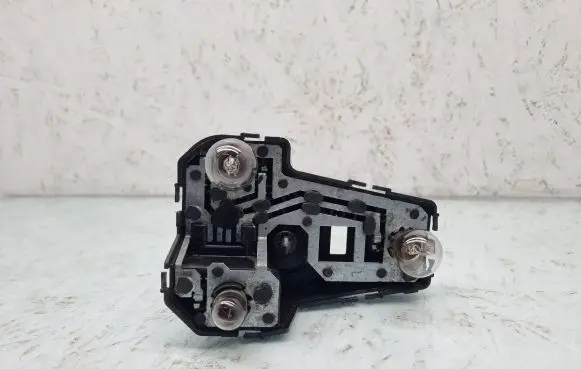 Volkswagen Sharan Tail light bulb cover holder 7M0945257A