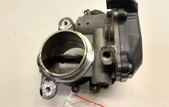 Volkswagen Golf VII Engine shut-off valve 04L128063T