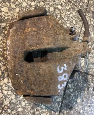 Volkswagen Golf V Front brake caliper