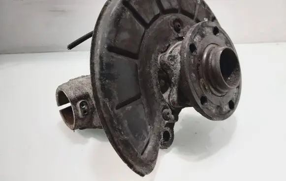 Volkswagen Touran I Front wheel hub spindle knuckle 1k0511