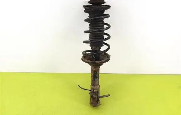 Toyota Yaris Front shock absorber with coil spring