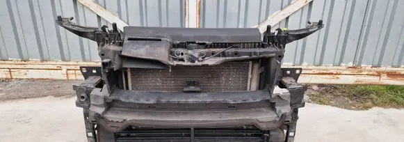 Radiator support slam panel