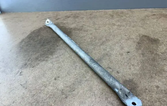 Radiator support slam panel bracket