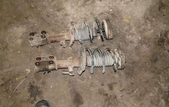 Renault Laguna III Front shock absorber/damper 543025668R