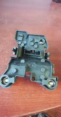 Tail light bulb cover holder