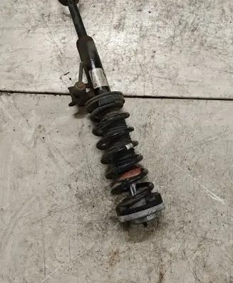 Front shock absorber with coil spring