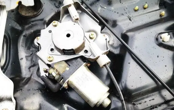 Front door window regulator motor