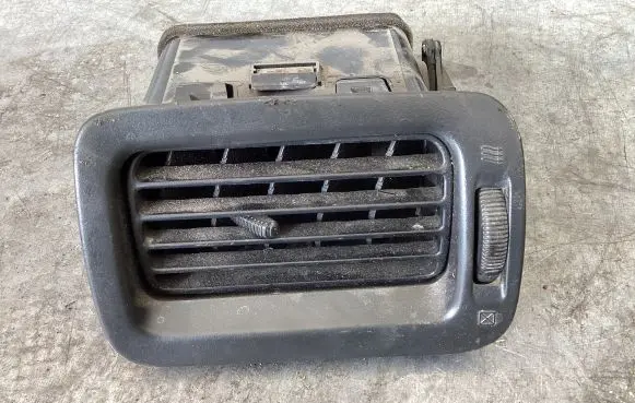 Subaru Forester SF Dash center air vent grill 66110FC030 E4515161100