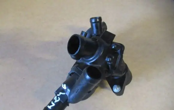 Thermostat/thermostat housing