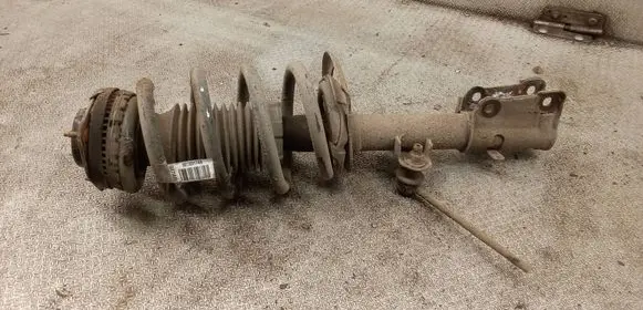 Chrysler Grand Voyager V Front shock absorber with coil spring 68136917AB