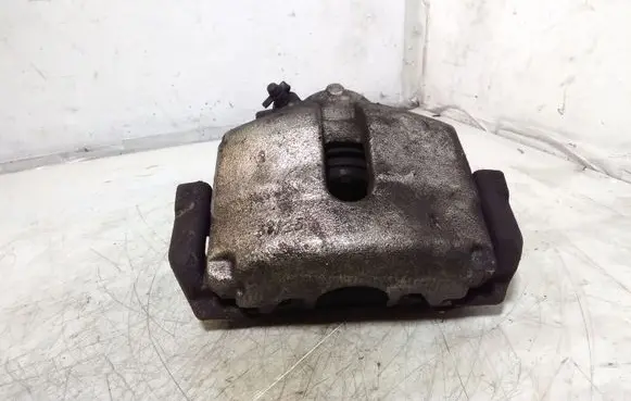 Volkswagen Golf VI Front brake caliper