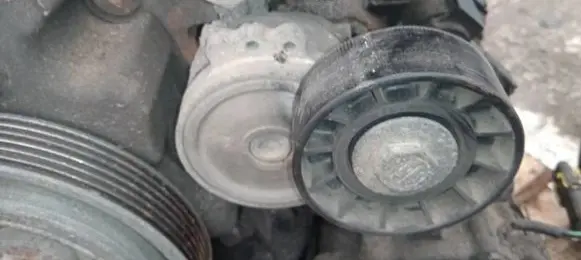 Generator/alternator belt tensioner