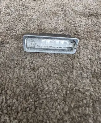 Volkswagen Golf VII Number plate light 1K8943021D
