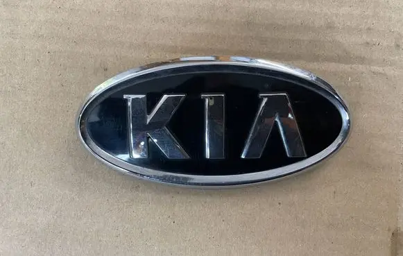 KIA Rio Manufacturer badge logo/emblem 86320-1W000