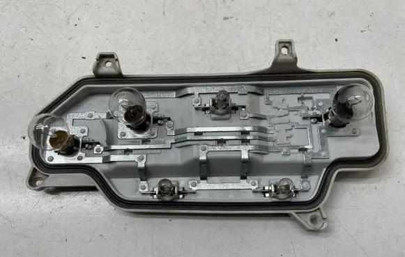 Volkswagen Caddy Tail light bulb cover holder 2K1945257B