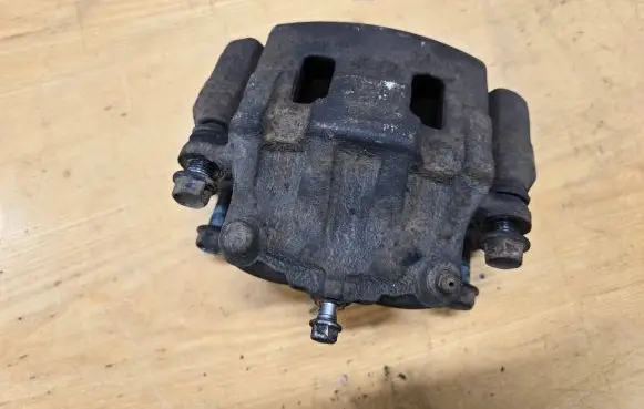Mazda CX-7 Front brake caliper K0089