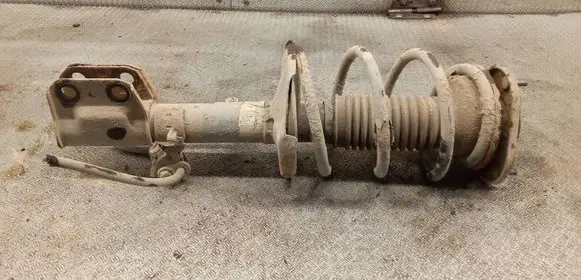 Front shock absorber with coil spring