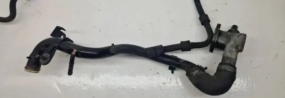 Volkswagen Golf IV Engine coolant pipe/hose 038121133A