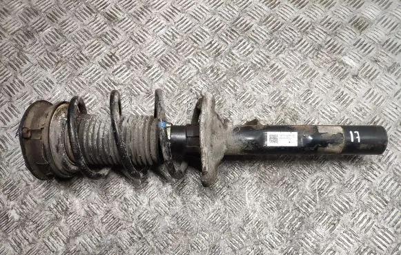 Volkswagen Golf VII Front shock absorber with coil spring 5Q0413023FJ