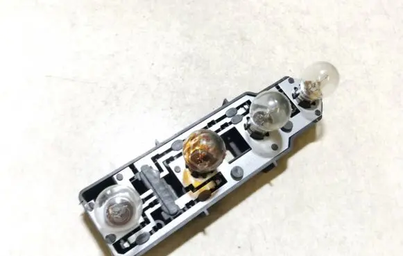 Mercedes-Benz C W202 Tail light bulb cover holder