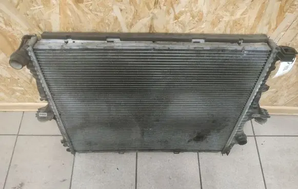 Volkswagen Touareg I Coolant radiator 7L6121253B