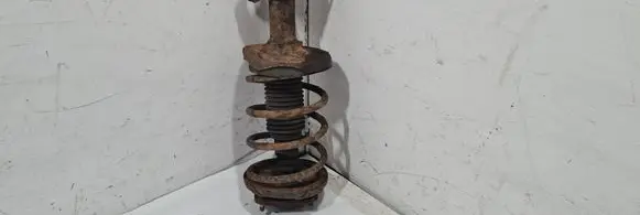 Mazda 323 Front shock absorber with coil spring BJ3D34900A B25G34011B