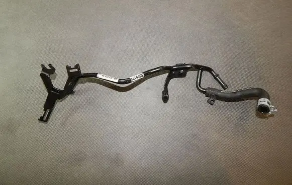 Volkswagen Golf VII Engine coolant pipe/hose 04L121070AB