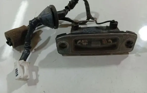 KIA Carens II Number plate light
