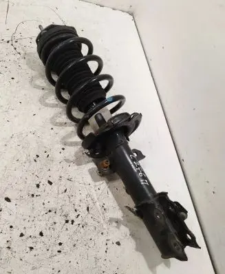 Front shock absorber with coil spring