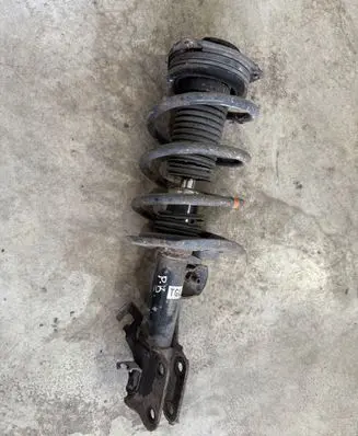 Nissan Leaf I (ZE0) Front shock absorber/damper