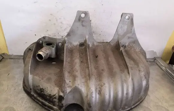 Volkswagen New Beetle Heat shield in engine bay 06A133228B