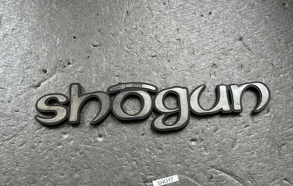 Mitsubishi Pajero Rear door emblem/model letters MB778137