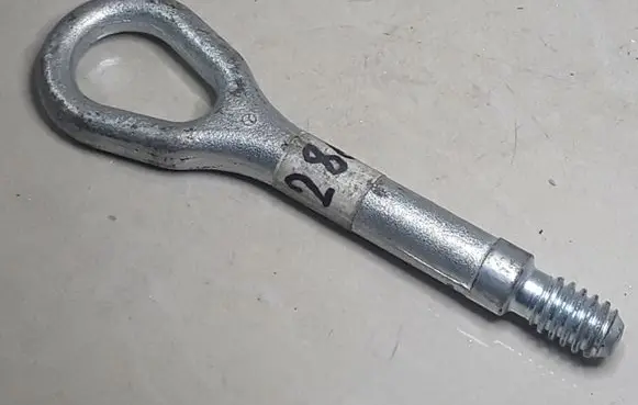 Towing hook eye