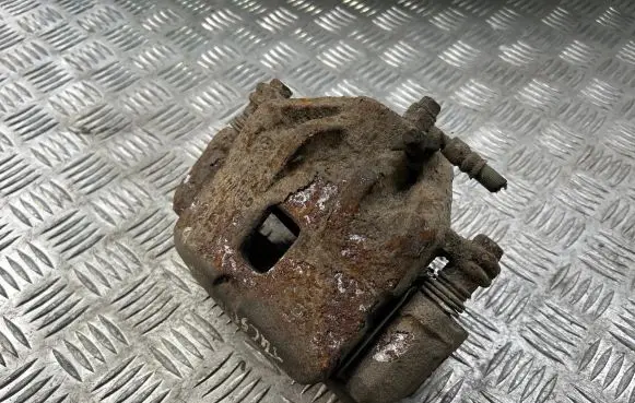 Hyundai Tucson JM Front brake caliper