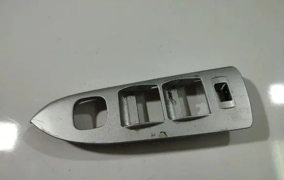 Mazda Premacy Front door window switch trim 