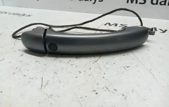 Volkswagen Touareg I Front door exterior handle 7L6837205 7L5839167A