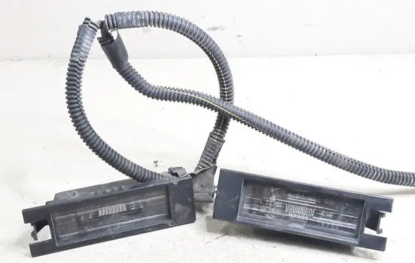 Opel Corsa D Number plate light 13251936