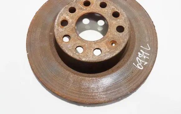 Volkswagen PASSAT B6 Rear brake disc neventiliuojamas