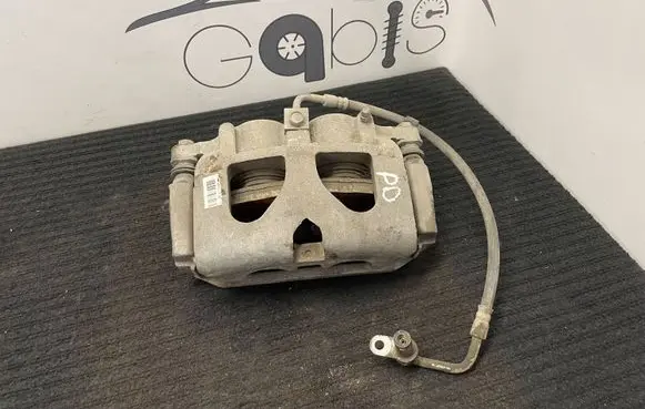 Dodge RAM Front brake caliper A002U688 9312