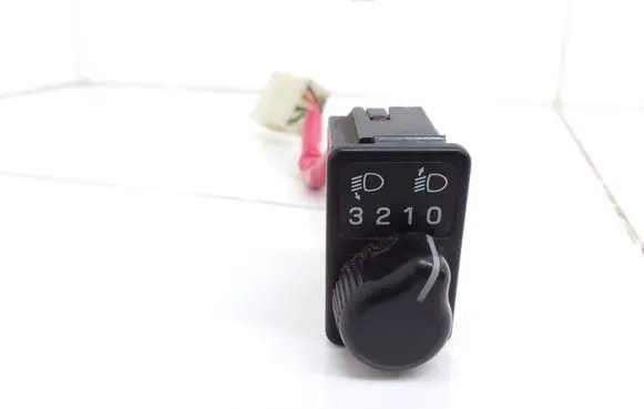 Subaru Impreza I Headlight level height control switch