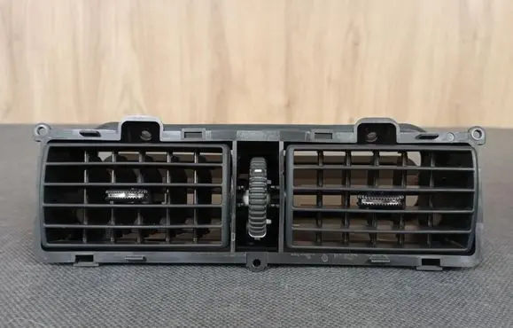 Dash center air vent grill