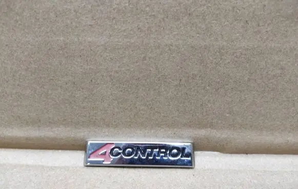 Renault Laguna III Front door emblem/model letters 990882613R